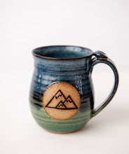 Load image into Gallery viewer, Pottery Mug with Mountains Adventure Mug Functional Ceramics thumb rest Clay mug in blue and green outdoors camping mug