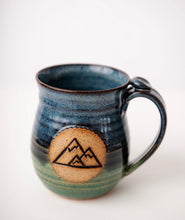 Load image into Gallery viewer, Pottery Mug with Mountains Adventure Mug Functional Ceramics thumb rest Clay mug in blue and green outdoors camping mug