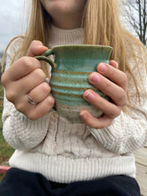 Load image into Gallery viewer, hands holding a Handmade Ceramic Tea Mug