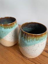 Load image into Gallery viewer, Set of two stoneware wine glasses. Green and white glaze.

