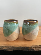 Load image into Gallery viewer, Set of two stoneware wine glasses. Green and white glaze.
