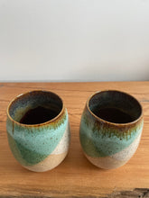 Load image into Gallery viewer, Set of two stoneware wine glasses. Green and white glaze.
