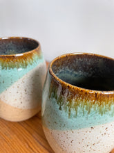 Load image into Gallery viewer, Set of two stoneware wine glasses. Green and white glaze.
