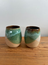 Load image into Gallery viewer, Set of two stoneware wine glasses. Green and white glaze.
