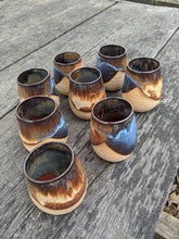 Load image into Gallery viewer, Set of 2 handthrown stoneware wine glasses. Dishwasher and food Safe. Blue, brown glaze.
