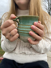 Load image into Gallery viewer, hands holding a Handmade Ceramic Tea Mug
