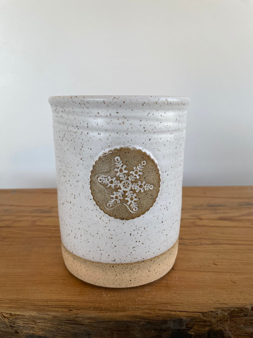 Utensil Crock with Winter Snowflake matte white glaze on speckled stoneware clay.