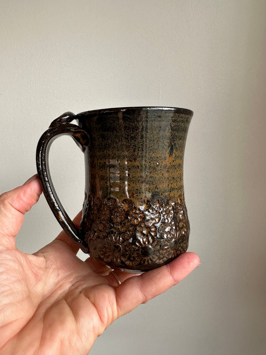 14 ounce coffee tea mug with thumb rest stoneware clay stamped flowers
