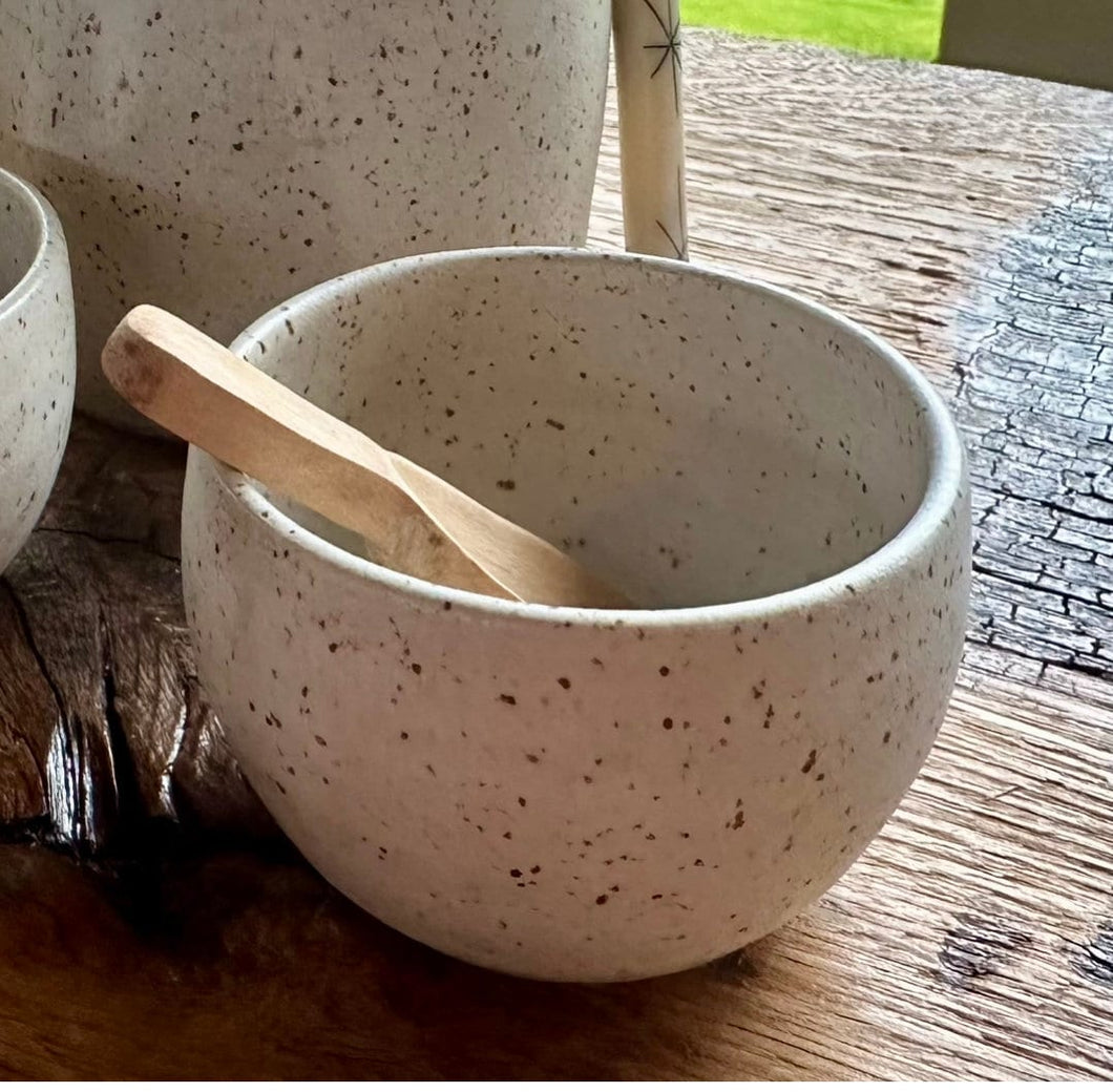 Small spice bowl with hand carved wooden spoon